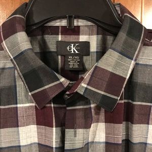 Men’s button up 100% cotton plaid shirt.